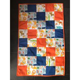Orange and navy and animal print quilt