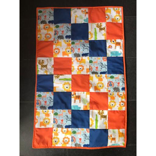 Orange and navy and animal print quilt