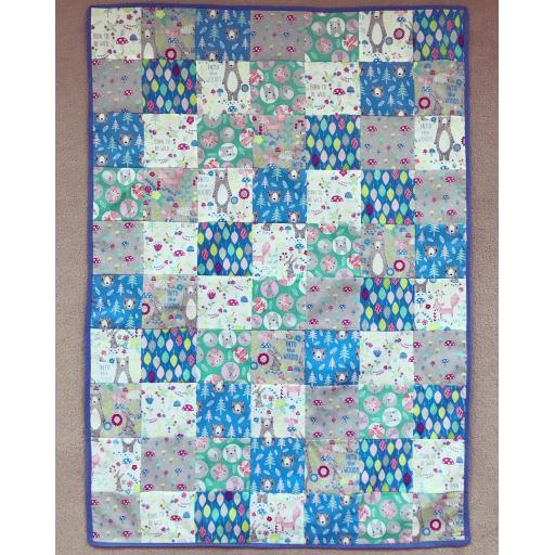 Blue, greens and greya and white forest friends quilt.jpg